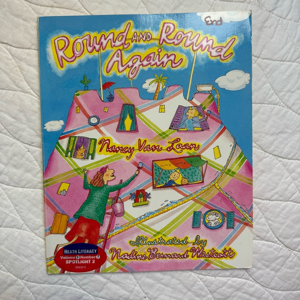 Round and Round Again by Nancy Van Laan 
Rhyming Fiction Paperback Book 1994